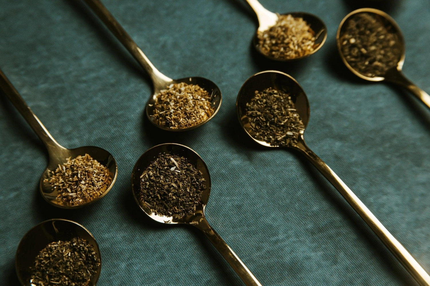several tablespoons with different ingredients